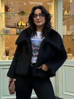Women's faux fur coat with large lapel